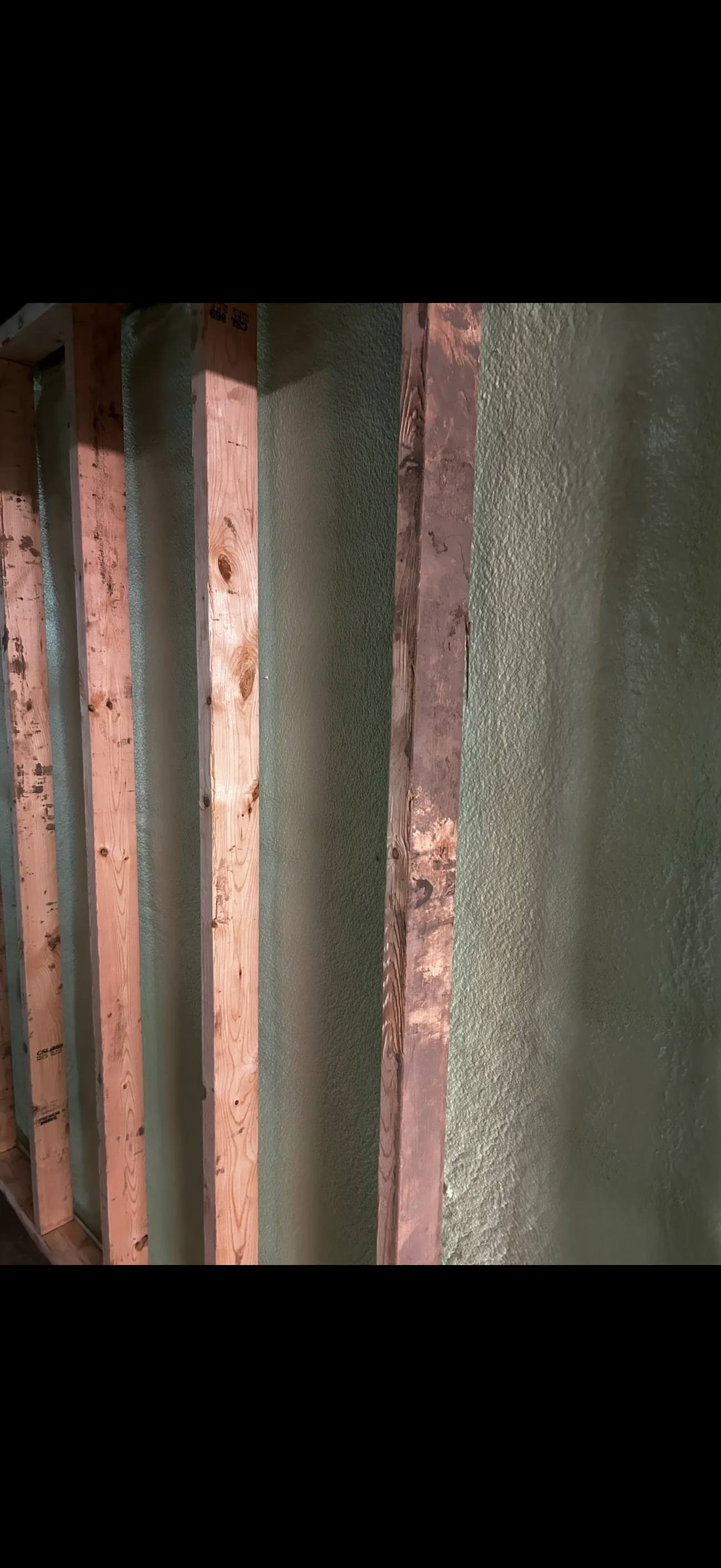 Closed-cell spray foam filling a wall assembly to a consistent depth